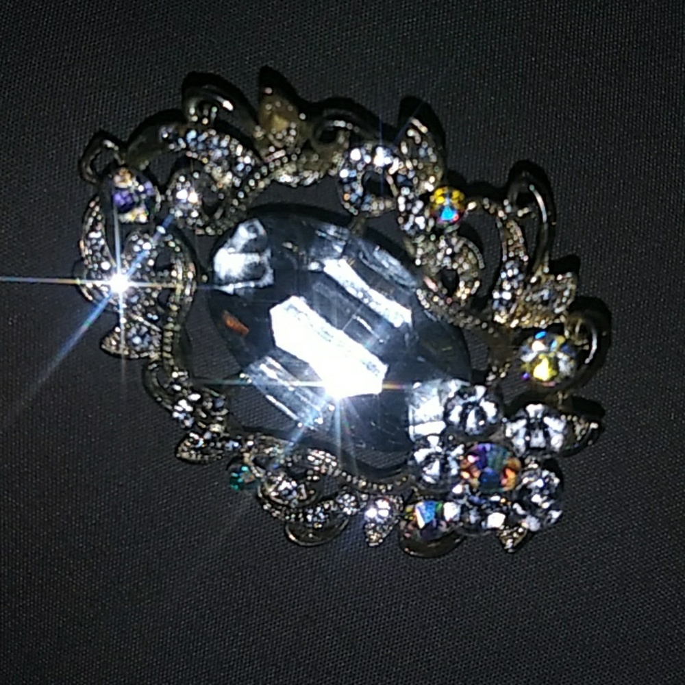 Silver and clear fancy brooch